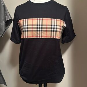 Burberry t- shirt brand new bought it at Holt renfrew